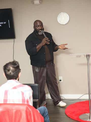 A speaker addressing the congregation at a Stroudsburg Sunday service